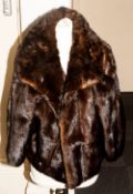 Ladies Dark Brown Mink Jacket, fully lined. Collar with revers. Slit pockets