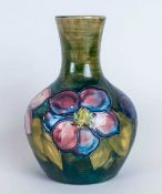 William Moorcroft Globual Shaped Vase 'Clematis' Design On Emerald Green Ground, Circa 1950's. 5''