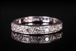 18ct White Gold Half Eternity Ring set with 7 diamonds of good colour. Est Diamond Weight 50pts.