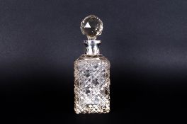 George V - Square Based Silver Topped and Cut Glass Perfume Bottle. Hallmark Birmingham 1921.