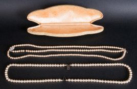 A Pair of 1920's Pearl Necklaces, One with a Sterling Silver Clasp. Boxed.