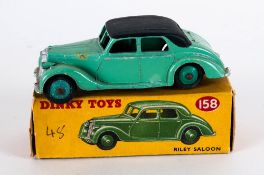 Dinky Toys No 158 Riley Saloon Diecast Model. Light Green Body, Black Roof, Green Hubs. Red And