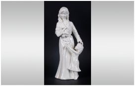 Royal Worcester Figurine 'New Arrival' RW4488, Issued 1990-2000. Modeller Maureen Hanson. 8.25''