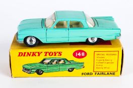 Dinky Toys No 148 Ford Fairlane Diecast Model. Non Metallic Pale Green Body, Chrome Hubs. Red And