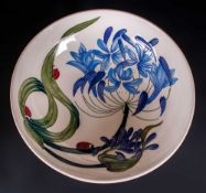 Moorcroft Large Modern Footed Bowl, Fly Away Home Collection - Ladybird Among Blue Petal Flowers.