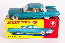 Dinky Toys No 147 Cadillac 62 Diecast Model. Metallic turquoise, cream interior. Complete With