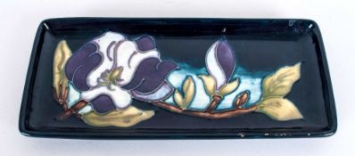 Moorcroft Rectangular Shaped Pin Tray with rare magnolia colourway on blue ground. 8'' in diameter.