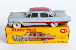 Dinky Toys No 192 De Soto Fireflite Sedan Diecast Model. Grey body, red roof and side flashes,