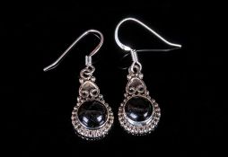 Black Star Diopside Drop Earrings, a pair of round cabochon cut black star diopsides, each