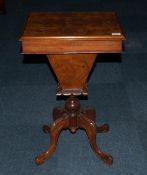 Victorian Walnut Ladies Sewing Box Table with a fitted interior contained in a shaped under