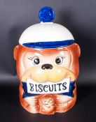 A Japanese Novelty Earthenware Lidded Biscuit Jar, Complete with box. 12'' in height.