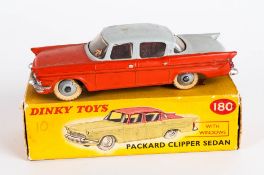 Dinky Toys No 180 Packard Clipper Sedan Diecast Model. Orange/Grey Body, Cream Wheels. Red And