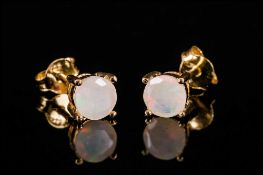 Faceted Opal Stud Earrings, two round cut opals, totalling .5ct, set in 14ct gold vermeil and silver