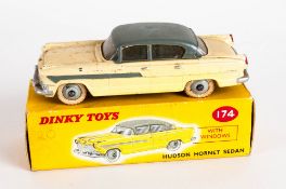 Dinky Toys No 174 Hudson Hornet Sedan Diecast Model. Yellow/Grey Body With Grey Hubs. Red And Yellow