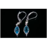 Swiss Blue Topaz Drop Earrings with peridot accents, the blue topaz of 2.6cts, in marquise cuts,