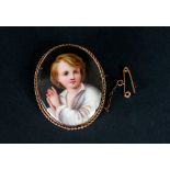 Victorian Oval Shaped 9ct Gold Framed Brooch With Painted Central Miniature With Of A Young Boy 1.