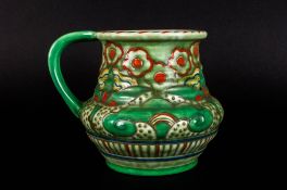 Charlotte Rhead Signed Crown Ducal Jug, Pattern number 4922 with Florian band of green painted &