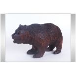 A Carved Black Forest Bear. 6.5 Inches In Length, With Bead Eyes.