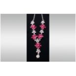 Deep Pink and White Crystal Floral Y Shaped Necklace, the pink flowers of six marquise cut