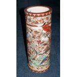A Tall Satsuma Pottery Umbrella Stand Decorated With Samurai Fighting Warriors, with a floral