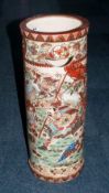 A Tall Satsuma Pottery Umbrella Stand Decorated With Samurai Fighting Warriors, with a floral