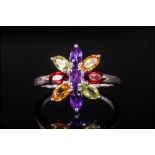 Multi Gemstone Flower Ring, the petals formed from marquise cut red garnets, amethysts, peridots and