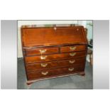 Georgian Mahogany Bureau Circa 1800 finely crossbanded to the flap and drawer fronts. The interior