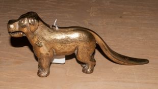 An Antique Brass Nutcracker in the form of a dog.