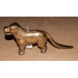 An Antique Brass Nutcracker in the form of a dog.