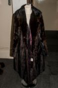 Ladies Dark Brown Mink Full Length Coat, fully lined. Collar with revers, slit pockets,