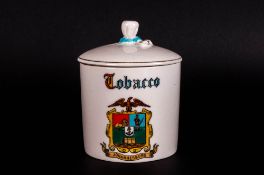 Goss Crested Ware Tobacco Jar and Cover, the cylindrical white jar showing the crest of Johannesburg