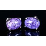 Russian Charoite Pair of Stud Earrings, each earring comprising a solitaire oval cut cabochon of the