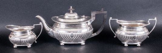 Edward VII Fine Silver Three Piece Tea Service Of Regency Form with half fluted decoration & pie-