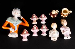 Collection of Eight Bone China Pin Cushion Models, comprising women in various poses. Varying from