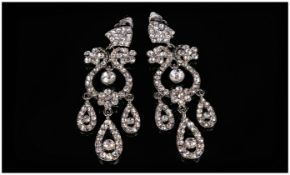 Crystal Chandelier Clip-On Statement Earrings, a pair of multi drop and loop white crystal glamorous