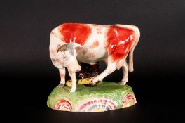 Obadiah Sherratt, Staffordshire Cow with attacking snake, iron red and cream cow, yellow snake,