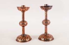 Arts & Crafts Period Pair Of Copper Candlesticks Circa 1880. Each stands 10.25'' in height.