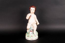 Staffordshire Pottery Figure of Bacchus with Drinking Cup 9.5 inches high. 19thC