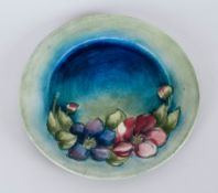 William Moorcroft Early Cabinet Plate 'Clematis' Design On Blue/Green Ground. Circa 1940. 7.5'' in