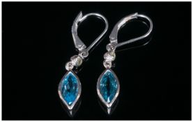 Swiss Blue Topaz Drop Earrings with peridot accents, the blue topaz of 2.6cts, in marquise cuts,