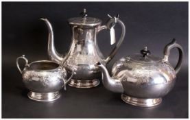 Three Piece EPNS Plated Tea Service, with engraving to the body. Melon Shaped with ebony handles.