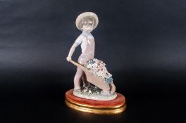 Lladro Figure ' Little Gardner ' Model Num.1283. Issued 1974. Height 9 Inches. Mint Condition with