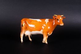 Beswick Animal Figure ' Guernsey Cow ' Model Num.1248B. Designer A. Gredington. Issued 1953.