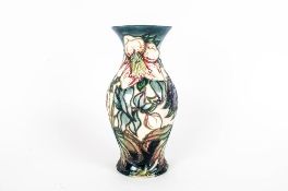 Moorcroft - Fine Tubelined and Shaped Vase ' Ashwood Hellebore ' Design. Designer Nicola Slaney.