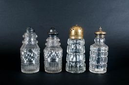 Four Cut Glass Cruet Castors With Tops, 5.5'' in height. Early 19th Century.