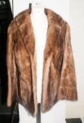 Ladies Short Pale Brown Mink Coat, fully lined, slit pockets, collar with revers.