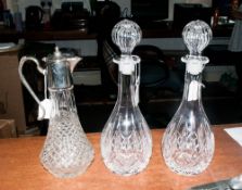 Two Cut Glass Decanters together with claret jug