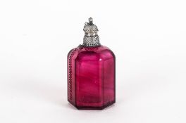 A 19th Century Very Finely Worked Silver Topped and Six Sided Ruby Red Small Perfume Bottle. The