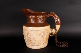 Stoneware Harvest Jug, riveted grey round handle, early 19thC. 9 inches high.