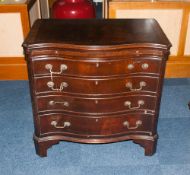 Chest of Drawers, with bow front and four drawers. With brass handles and measuring 36 inches high